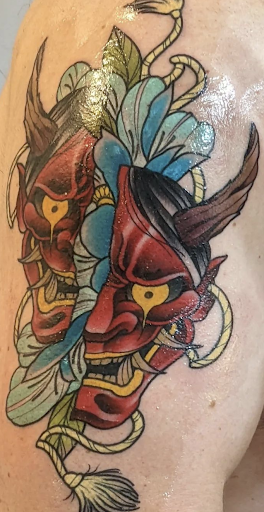 Explore name neck tattoo ideas, creative tattoo ideas in West Jefferson, available at Black Dagger Tattoo Collective