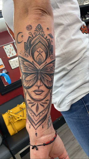 Explore small one piece tattoo ideas, creative tattoo ideas in La Habra, available at Raining Ink Tattoo Studio