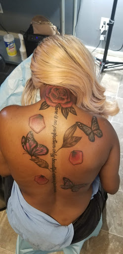 Explore sunlight tattoo ideas, creative tattoo ideas in Albany, available at Tat Jones Ruthless Tattoos L.L.C.