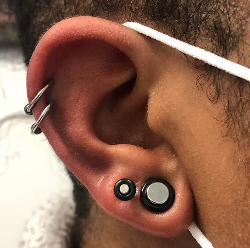 Explore athletic tattoo ideas, creative tattoo ideas in West Chester, available at Piercing by Jacqueline at X-Treme Ink Tattoo