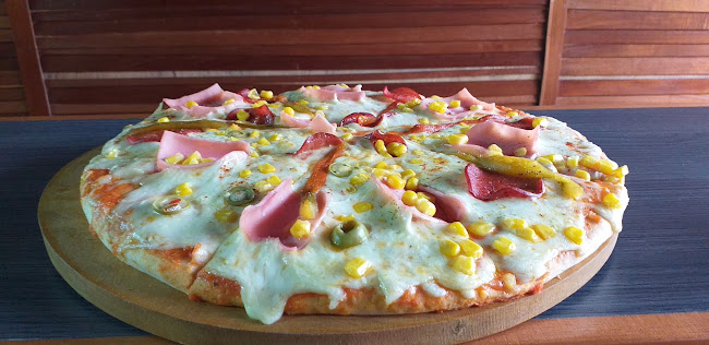 El Hornero "Pollos & Pizzas"