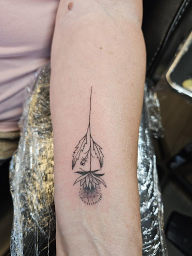 Explore mens tattoo ideas forearm, creative tattoo ideas in Palm Harbor, available at Angry Owl Tattoo and Piercing