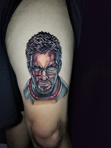 Explore under knee tattoo ideas, creative tattoo ideas in Buford, available at Inked Arts Tattoo Studio