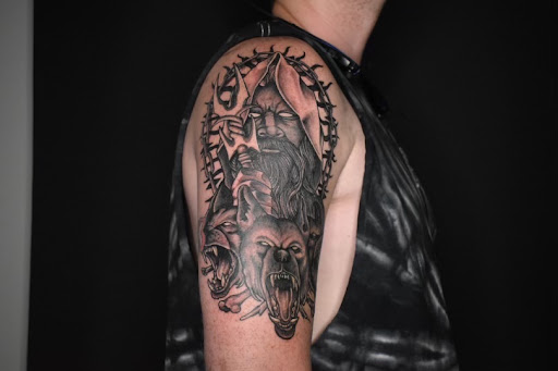 Explore tattoo ideas arm shoulder, creative tattoo ideas in Portsmouth, available at World Famous Blue Horseshoe Tattoo and Piercing