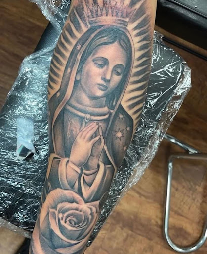 Explore tattoo ideas for roses, creative tattoo ideas in Amarillo, available at Puppeteer Ink Tattoo Studio