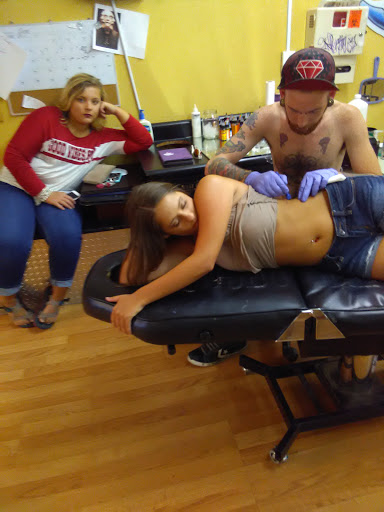 Explore father tattoo ideas for daughter, creative tattoo ideas in Florence, available at West Coast Tattoo & Body Piercing