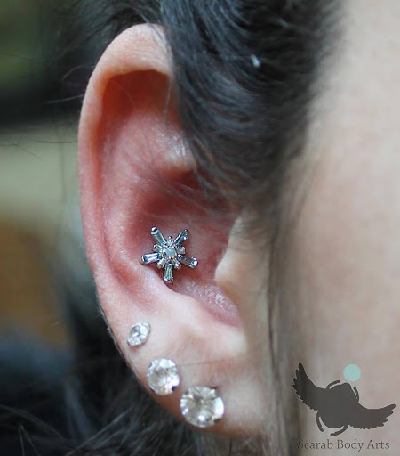 Explore new years tattoo ideas, creative tattoo ideas in Syracuse, available at Scarab Body Arts