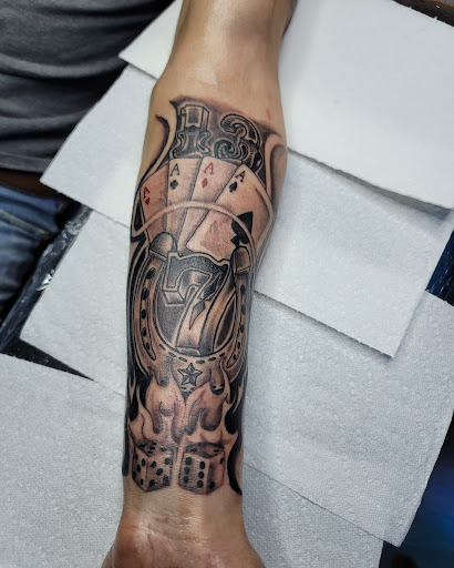 Explore cover up sleeve tattoo ideas, creative tattoo ideas in Chattanooga, available at The Sailors Den Tattoos and Piercing & The Scurvy Pearl Music Venue