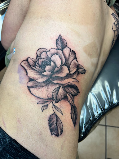 Explore tattoo ideas for father of daughter, creative tattoo ideas in Rapid City, available at Convicted Designs Tattoo & Piercing