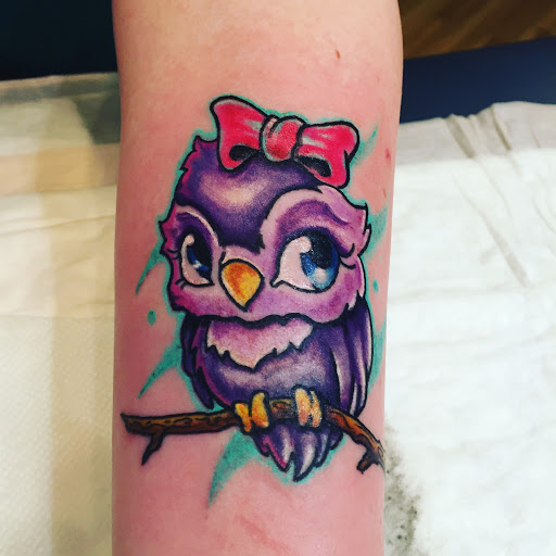 Explore women's wrist tattoo ideas, creative tattoo ideas in Ottumwa, available at Family Tradition TattoosPiercings