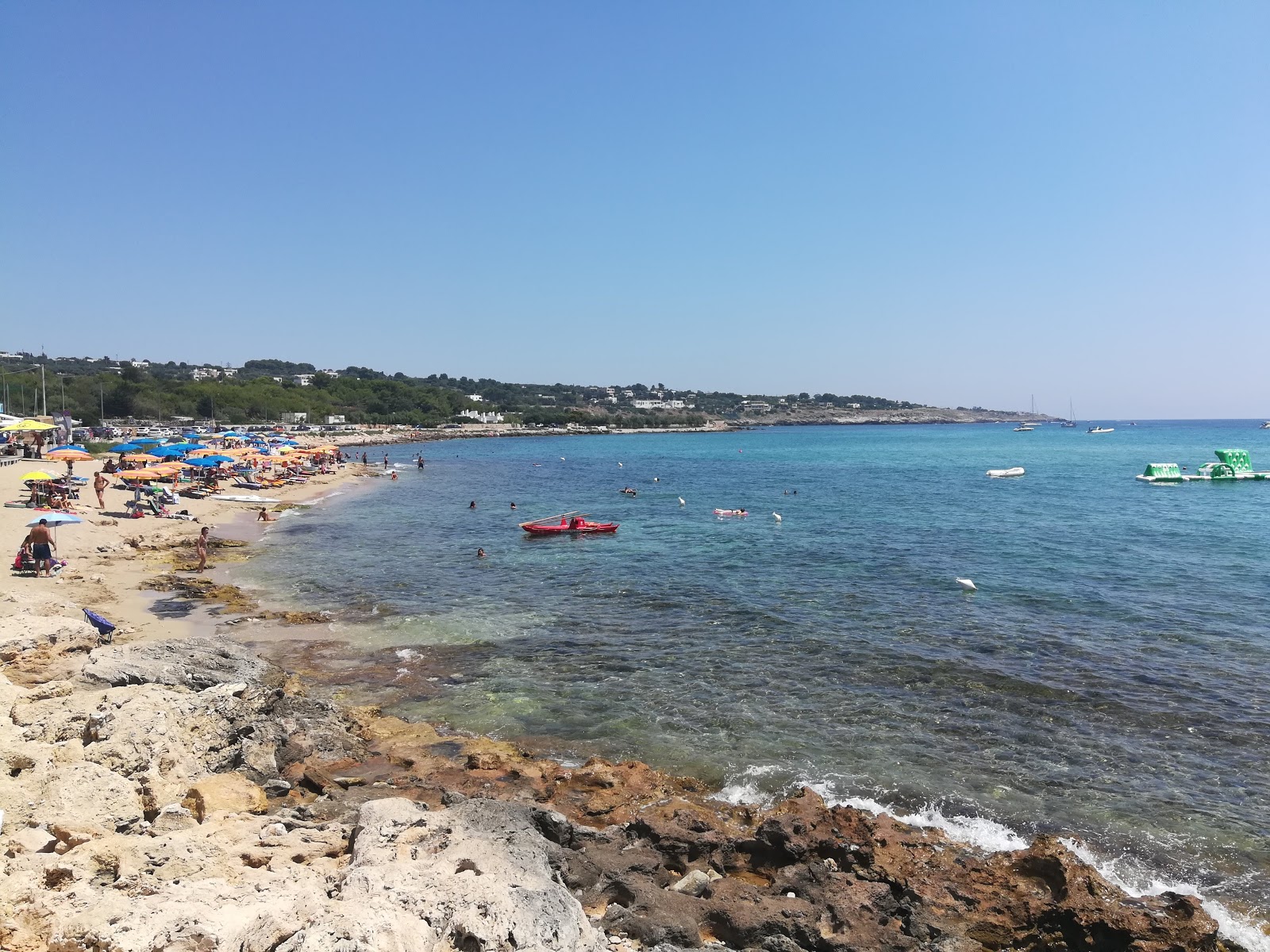 Fotografija Felloniche Spiaggia z modra čista voda površino