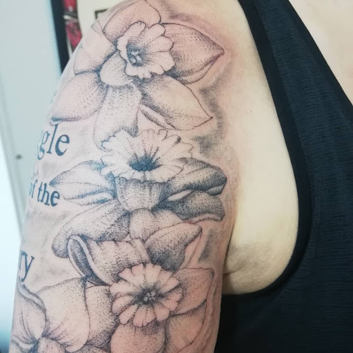 Explore flower finger tattoo ideas, creative tattoo ideas in Hayward, available at Three Tentacles Tattoo Studio