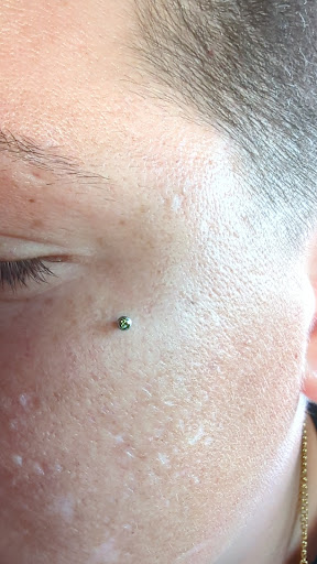 Explore guitar pick tattoo ideas, creative tattoo ideas in Salem, available at Medusa Body Piercing