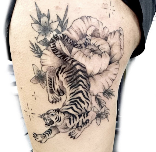 Explore women's collarbone tattoo ideas, creative tattoo ideas in Valdosta, available at Acid Ink Tattoos