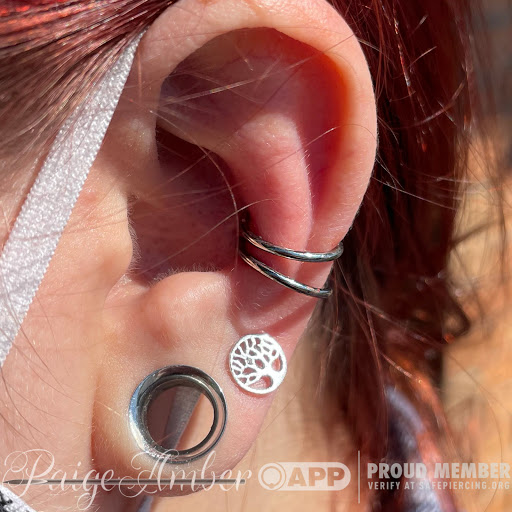 Explore tattoo ideas on hand, creative tattoo ideas in Oshkosh, available at Piercings by Paige at Big Guns Tattoo