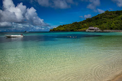 Palau Pacific Resort'in fotoğrafı geniş bir kıyı şeridi ile birlikte