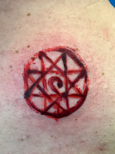 Explore bourbon glass tattoo idea, creative tattoo ideas in Modesto, available at Inkwell Tattoo