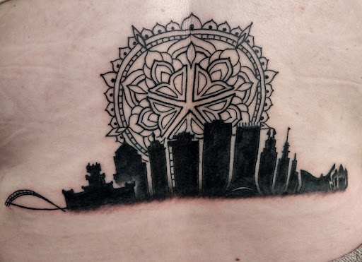 Explore archangel michael tattoo ideas, creative tattoo ideas in Rochester, available at Axe of Kindness Tattoo