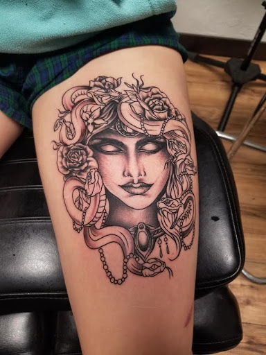 Explore is a neck tattoo a bad idea, creative tattoo ideas in Edinboro, available at No Regrets Tattoo (Appointment Only)