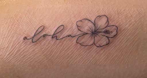 Explore hand small tattoo ideas, creative tattoo ideas in Honolulu, available at Black Palette Tattoo & Piercing