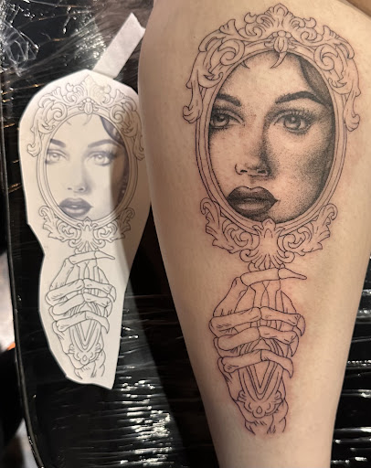 Find poppy tattoo ideas for your next unique tattoo in Lenoir at Golden Cardinal Gallery