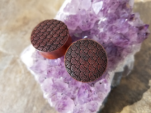 Explore buddhism tattoo ideas, creative tattoo ideas in Powell, available at Against All Odds Tattoos and Piercings