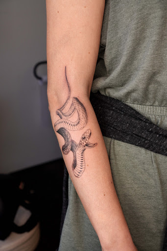 Explore chain link tattoo ideas, creative tattoo ideas in Portland, available at Midnight Tattoo