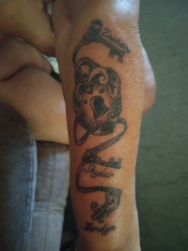 Explore female arm tattoo ideas, creative tattoo ideas in Savannah, available at Tattoo Addictions