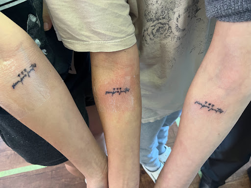 Explore hourglass tattoo ideas, creative tattoo ideas in Rogers, available at Ink Solutions Tattoo