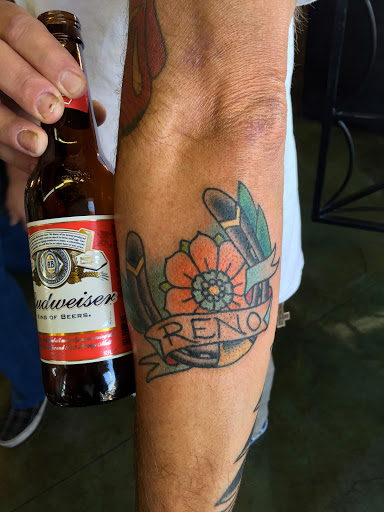 Explore roman numeral tattoo ideas for females, creative tattoo ideas in Reno, available at Aces Tattoo