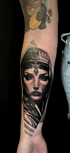 Find tattoo ideas snake for your next unique tattoo in Mesa at Next Wave Tattoos and Piercings