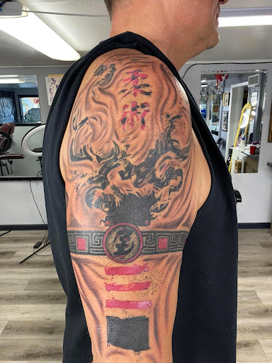 Explore arm tattoo sleeve ideas, creative tattoo ideas in Holland, available at Mi Vida Ink