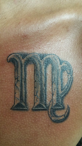 Explore name cover up tattoo ideas male, creative tattoo ideas in Buffalo, available at Wishful Inking Tattoos & Piercings