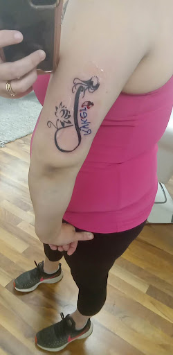 Explore roman numeral tattoo ideas for females, creative tattoo ideas in Kenosha, available at NicJan Studio