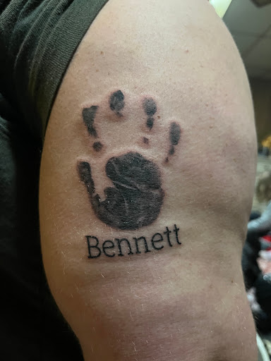 Explore father tattoo ideas, creative tattoo ideas in Geneva, available at The Lonesome Rose Tattoo Parlor
