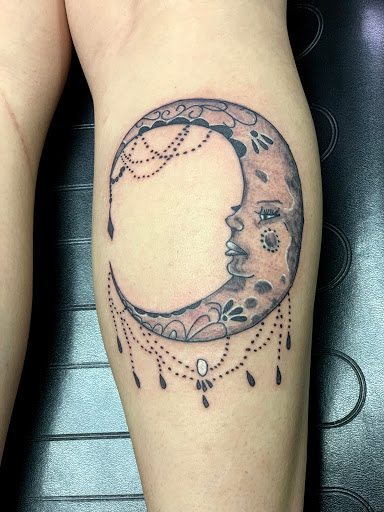 Find tattoo ideas for under the breast for your next unique tattoo in Hudson Falls at ALTERED ADDICTION TATTOOS