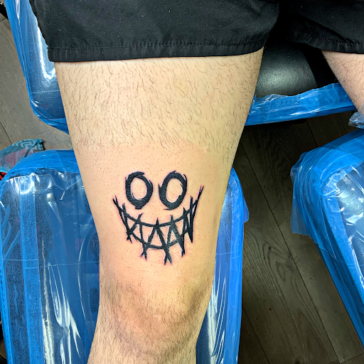 Explore one piece tattoo ideas, creative tattoo ideas in Springfield, available at Red Tip Tattoos