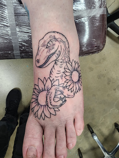 Explore small skull tattoo ideas, creative tattoo ideas in Maryland Heights, available at Thirteen Roses Tattoo & Aesthetics