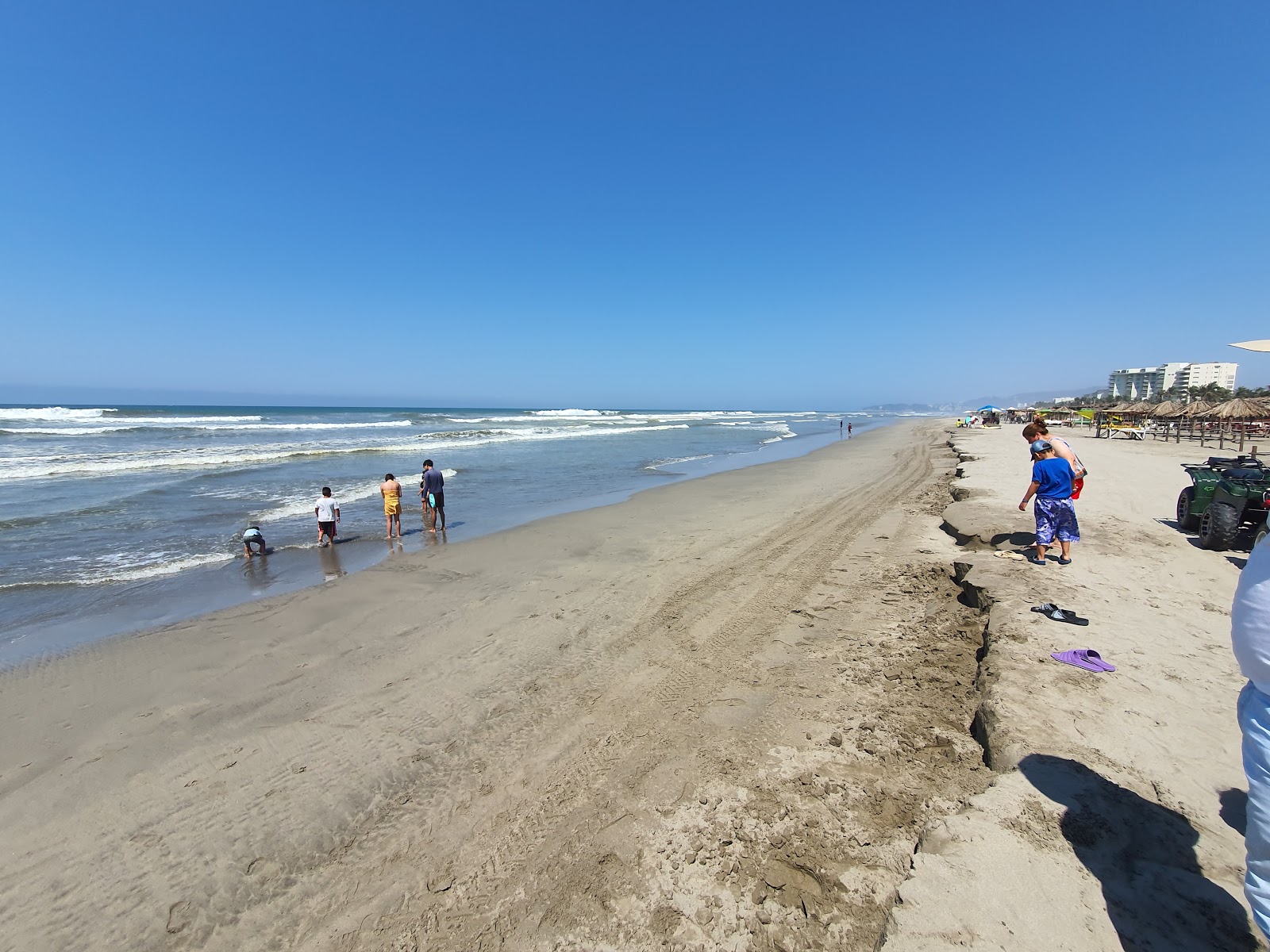 Foto von Playa La Bonfil mit feiner beiger sand Oberfläche