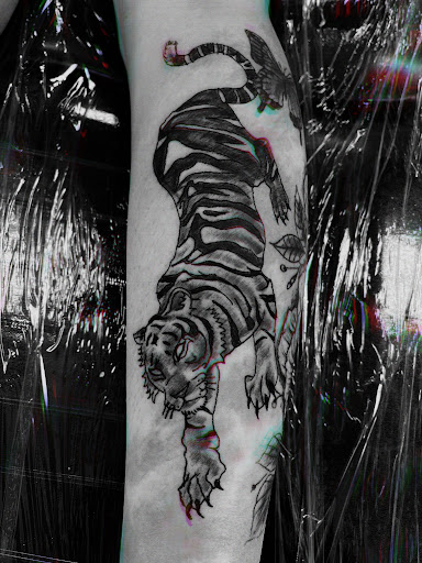 Explore mothman tattoo ideas, creative tattoo ideas in Seymour, available at American Gypsy Tattoo Corp.