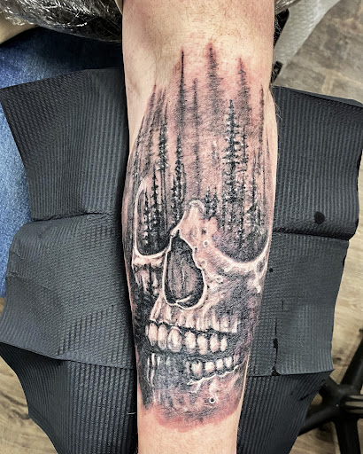 Find spinal cord tattoos ideas for your next unique tattoo in Anchorage at Unique Ink AK
