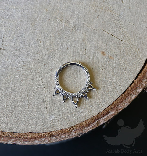 Explore small dragon tattoo ideas, creative tattoo ideas in Syracuse, available at Scarab Body Arts