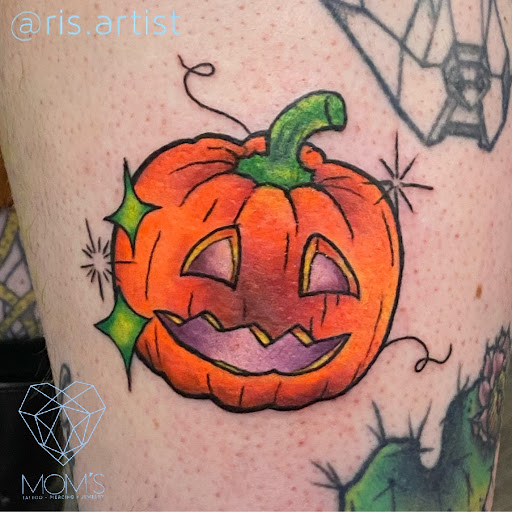 Explore small color tattoo ideas, creative tattoo ideas in Spokane, available at Moms Custom Tattoo & Body Piercing