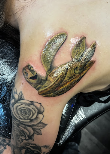 Find top of shoulder tattoo ideas for your next unique tattoo in Silver City at Independent Ink Tattoo
