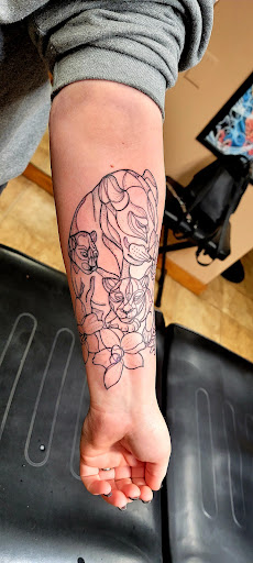 Find tattoos ideas for mothers for your next unique tattoo in Conway at Primal Urge Tattoos