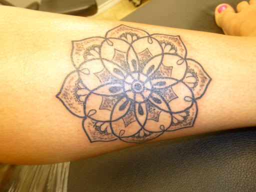 Tattoo Shop «magnum opus tattoo company», reviews and photos, 1817 Padre Blvd #4, South Padre Island, TX 78597, USA