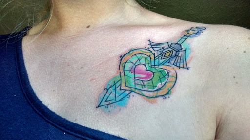 Explore chest and neck tattoo ideas, creative tattoo ideas in Elizabethtown, available at Big Daddys Tattoo