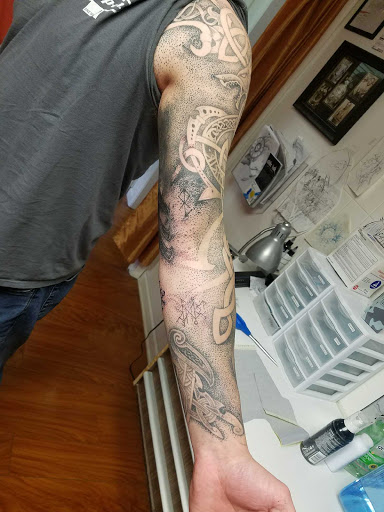 Find forearm tattoo ideas for your next unique tattoo in Warren at Elite Ink Tattoo Studios