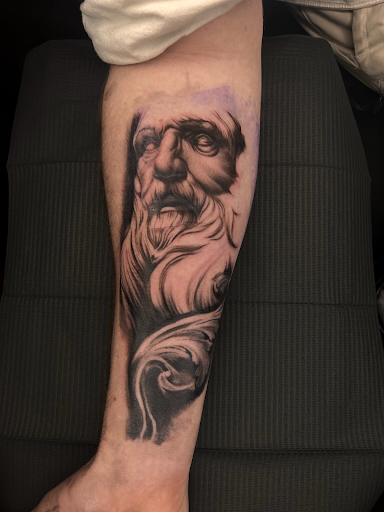 Find angel tattoo ideas for men for your next unique tattoo in Henrico at Ink Therapy Tattoo Lounge