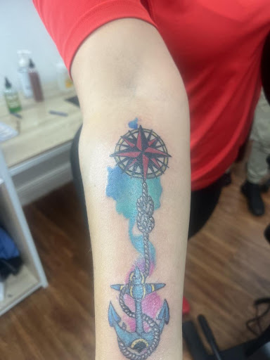 Explore tattoo ideas aquarius, creative tattoo ideas in Cocoa, available at Rorschach Tattoo Shop and Piercing Studio